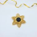 Vintage Givenchy Gold Star with Black Cabochon Brooch
