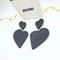 Moschino Zwarte Hartvormige Statement XL Clip Oorbellen