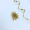 Marcel Boucher gouden bloem broche