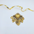 Zoe Coste Broche Met Hangende Hartbedels
