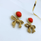 Moschino Statement Strik Clip Oorbellen