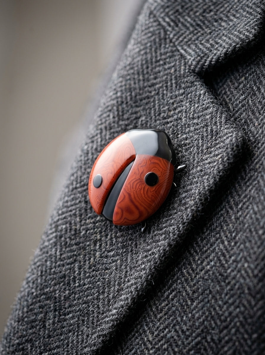 Vintage Lea Stein Ladybird Brooch in Rhodoid – worn by model, close-up