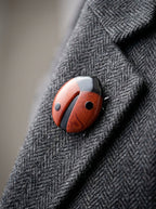 Vintage Lea Stein Ladybird Brooch in Rhodoid – worn by model, close-up