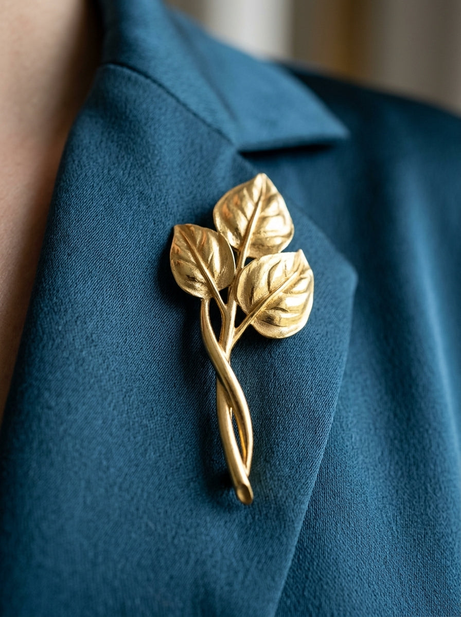 Vintage Trifari XL Gold Leaf Brooch – worn by model, close-up