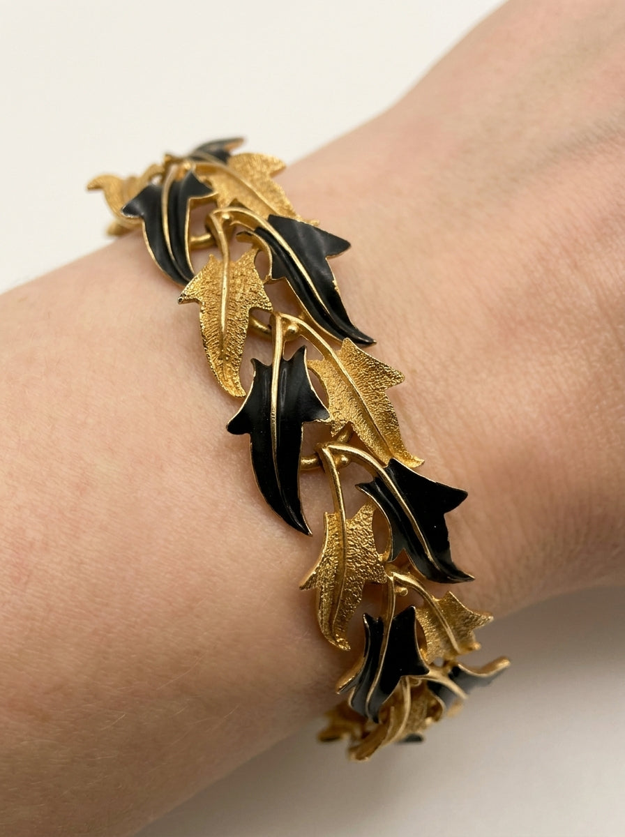 Vintage Trifari Black Enamel & Gold-Tone Leaf Statement Bracelet – worn by model, close-up