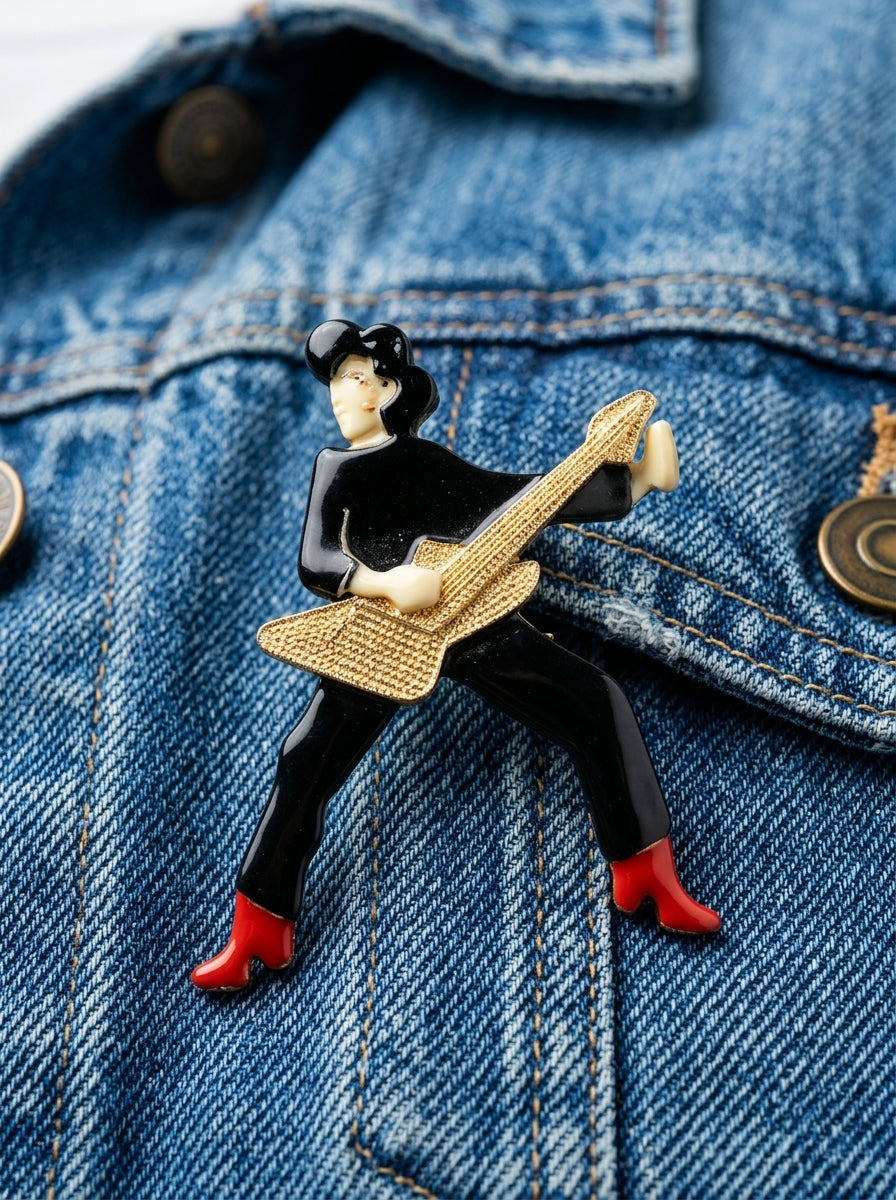 Vintage Lea Stein Guitarist Figure Brooch in Rhodoid – worn by model, close-up