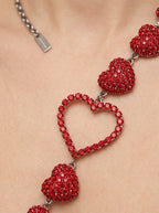 Vintage Moschino Red Hearts Statement Necklace – worn by model, close-up