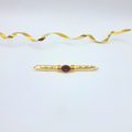 Avon – Gold-Tone Bar Brooch with Red Stone, vintage 1980s