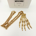Vintage Moschino – Couture Skeleton Hand Necklace