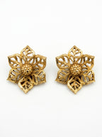 Vintage Christian Dior goudkleurige bloem-clipoorbellen