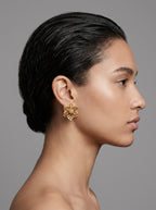 Vintage Christian Dior goudkleurige bloem-clipoorbellen