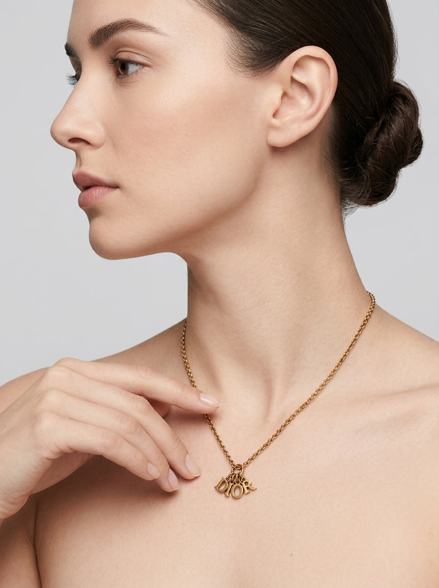 Christian Dior Vintage Gold-Tone Necklace with Charm Pendant